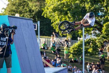Munich, Germany - Aug 11, 2022: Riders compete at the BMX Freestyle European Championsships at Olympiapark in Munich, Germany. Men's qualifiacation