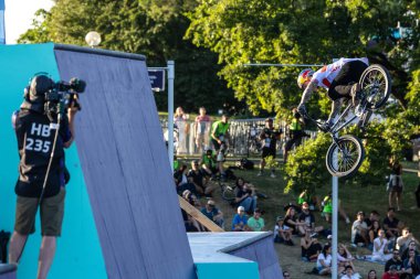 Munich, Germany - Aug 11, 2022: Riders compete at the BMX Freestyle European Championsships at Olympiapark in Munich, Germany. Men's qualifiacation