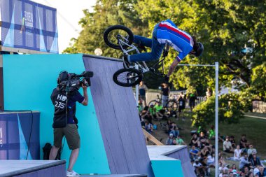 Munich, Germany - Aug 11, 2022: Riders compete at the BMX Freestyle European Championsships at Olympiapark in Munich, Germany. Men's qualifiacation