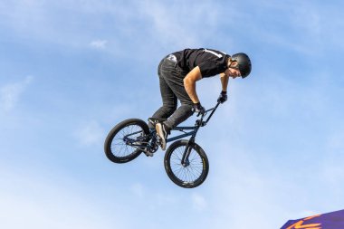 Munich, Germany - Aug 11, 2022: Riders compete at the BMX Freestyle European Championsships at Olympiapark in Munich, Germany. Men's qualifiacation