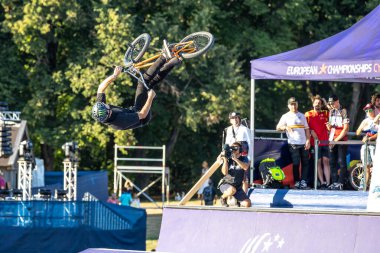 Munich, Germany - Aug 11, 2022: Riders compete at the BMX Freestyle European Championsships at Olympiapark in Munich, Germany. Men's qualifiacation