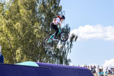 Munich, Germany - Aug 12, 2022: Riders compete at the BMX Freestyle European Championsships at Olympiapark in Munich, Germany. Men's qualifiacation