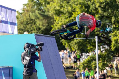Munich, Germany - Aug 11, 2022: Riders compete at the BMX Freestyle European Championsships at Olympiapark in Munich, Germany. Men's qualifiacation