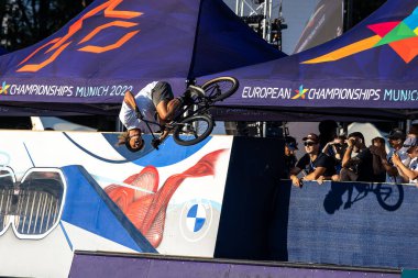 Munich, Germany - Aug 11, 2022: Riders compete at the BMX Freestyle European Championsships at Olympiapark in Munich, Germany. Men's qualifiacation