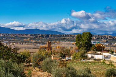 Guadix, Spain - Nov 27, 2022: Guadix in the Sierra Nevada territory, province of Granada, Andalusia, Spain. Guadix is famous for its cave houses. These cave houses are up in the Troglodyte Quarter