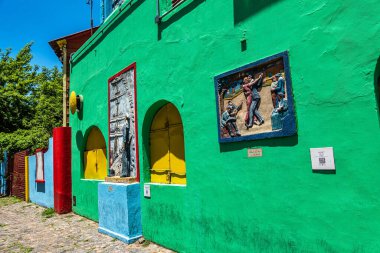 Colorful buildings in Caminito street in La Boca neighborhood at Buenos Aires, Argentina. It was a port area where Tango was born, now tourist destination with colorful houses and pedestrian stree