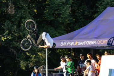 Munich, Germany - Aug 11, 2022: Riders compete at the BMX Freestyle European Championsships at Olympiapark in Munich, Germany. Men's qualifiacation