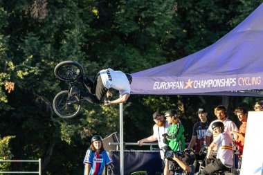 Munich, Germany - Aug 11, 2022: Riders compete at the BMX Freestyle European Championsships at Olympiapark in Munich, Germany. Men's qualifiacation