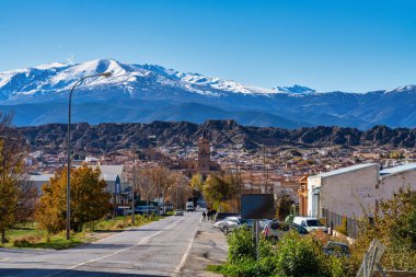 Guadix, Spain - Nov 27, 2022: Guadix in the Sierra Nevada, province of Granada, Andalusia, Spain. Guadix is famous for its cave houses up in the hills in the Troglodyte Quarter of the city