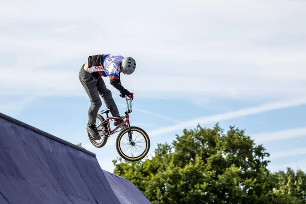 Munich, Germany - Aug 11, 2022: Riders compete at the BMX Freestyle European Championsships at Olympiapark in Munich, Germany. Men's qualifiacation