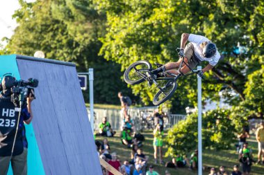 Munich, Germany - Aug 11, 2022: Riders compete at the BMX Freestyle European Championsships at Olympiapark in Munich, Germany. Men's qualifiacation