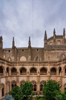 Toledo, Spain - Dec 02, 2022: Gothic atrium of Monastery of San Juan de los Reyes in the Old city of Toledo, Spain, UNESCO World Heritage