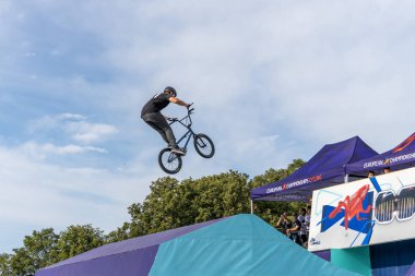 Munich, Germany - Aug 11, 2022: Riders compete at the BMX Freestyle European Championsships at Olympiapark in Munich, Germany. Men's qualifiacation