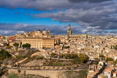 Toledo, Spain - Nov 30, 2022: Old city with its Alcazar, Royal Palace over the Tagus River sinuosity. Spain, Europe