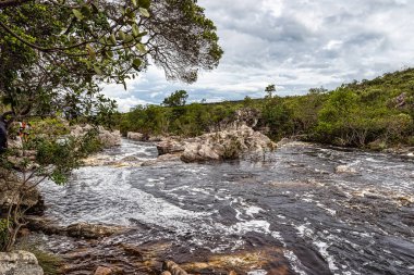 View of the river Mucugezinho with running water, forming a waterfall and Poco do Pato, in Chapada Diamantina, Bahia, Brazil