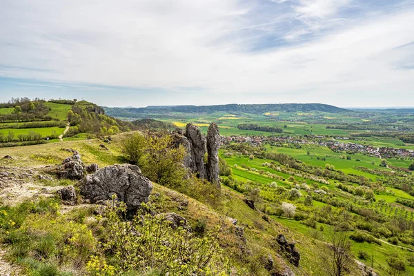 stock image Ehrenbuergstein and the walberla rock, the stone woman, near village Kirchehrenbach, county Forchheim, upper franconia, bavaria, germany