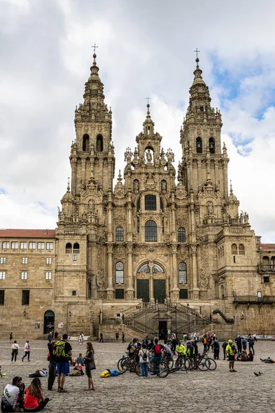 stock image Santiago de Compostela, Spain - Jun 18, 2023: Pilgrims and tourists in front of the Cathedral at Santiago de Compostela, Galicia, Spain.