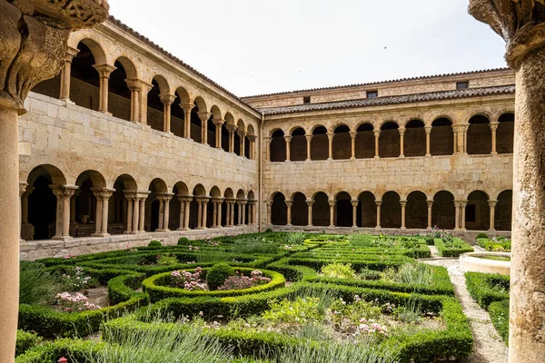 stock image Burgos, Spain - Jun 16, 2023: The cloister of Santo Domingo de Silos Abbey at Burgos, Spain. It is a Benedictine monastery and a masterpiece of Romanesque art.