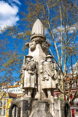 Monument to the Portuguese soldiers who died in World War I in Coimbra, Portugal. Monument in the Jardim da Avenida Sa da Bandeira in Santa Cruz, Coimbra, Portugal. clipart