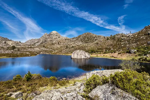 stock image Beautiful lake at top of Penameda hill in national park Peneda Geres in Portugal. Pantano da Peneda