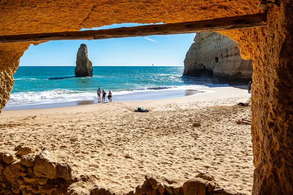 stock image Benagil, Portugal - Feb 19, 2024: Portuguese coast in Benagil, Algarve, Portugal. Praia do Carvalho. Percurso dos Sete Vales Suspensos. Seven Hangging Valleys Trail.