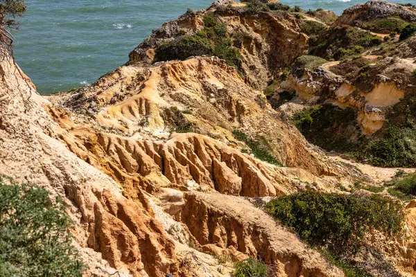 stock image Praia da Marinha Beach among rock islets and cliffs seen from Seven Hanging Valleys Trail, Percurso dos Sete Vales Suspensos. Algarve, Portugal