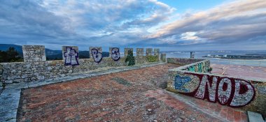 Troia , Portugal - Mar 01, 2024: 7th Battery of the Outao Coastal Artillery Regiment in the Serra da Arrabida, Portugal. An important coastal defense unit, in operation until 1998, now abandoned clipart