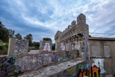 Troia , Portugal - Mar 01, 2024: 7th Battery of the Outao Coastal Artillery Regiment in the Serra da Arrabida, Portugal. An important coastal defense unit, in operation until 1998, now abandoned clipart