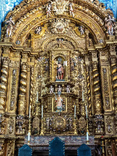 stock image Almancil, Portugal - Feb 17, 2024: Main altar of Igreja de Sao Lourenco church in Almancil, Portugal, with religious sculptures and azulejos tiles.