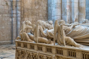 Alcobaca, Portugal - Mar 08, 2024: The tomb of king Pedro I in the Alcobaca Monastery, a Medieval Roman Catholic monastery located in the town of Alcobaca, Portugal clipart