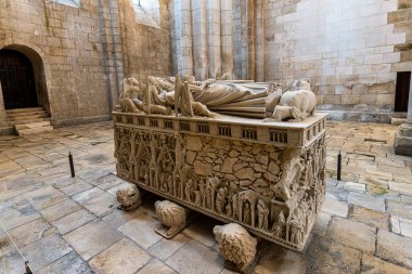 Alcobaca, Portugal - Mar 08, 2024: The tomb of king Pedro I in the Alcobaca Monastery, a Medieval Roman Catholic monastery located in the town of Alcobaca, Portugal clipart