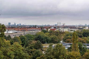 Autumn view of the Luitpold park, located near the Olympic Park in Munich, Bavaria, Germany clipart