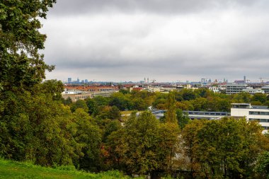 Autumn view of the Luitpold park, located near the Olympic Park in Munich, Bavaria, Germany clipart