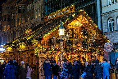 Munich, Germany - Dec 17, 2023: Christmas market at Sendlinger street in Munich, Bavaria, Germany in Europe clipart