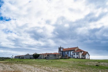 The sanctuary complex Santuario de Nossa Senhora do Cabo Espichel, which includes the church still in use today, located to the west of Sesimbra, Portugal clipart