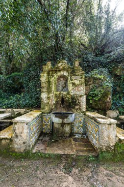 Abandoned and empty medieval Convento dos Capuchos in the Serra de Sintra National Park in Portugal clipart