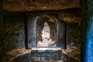 Abandoned and empty medieval Convento dos Capuchos in the Serra de Sintra National Park in Portugal clipart