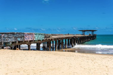 Ruined structure of the old Metal Bridge at Fortaleza in the state of Ceara, Brazil. Historic place, much sought after by tourists clipart