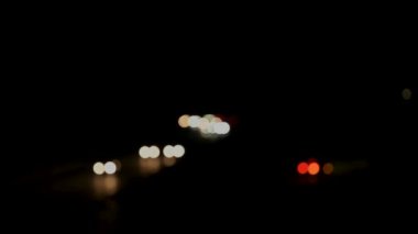 White front and red rear lights as a bokeh effect at night