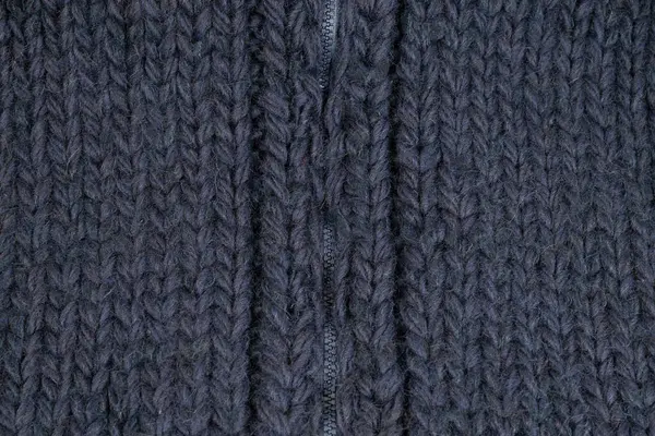dark blue chunky knit cardigan made of alpaca and mohair wool for background use