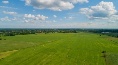 Drone aerial view of various agricultural fields in Schleswig Holstein Germany clipart