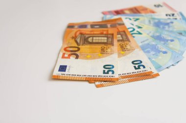 Euro money banknotes on a light background close up.