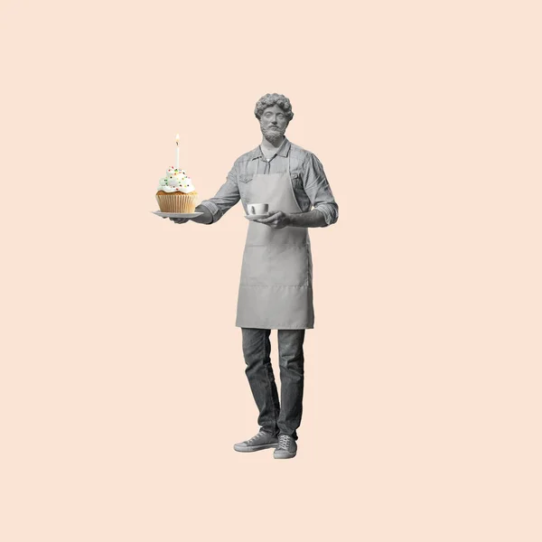ontemporary art collage of a man headed by a statue head holding a cupcake with a candle. Party time. Concept of birthday invitation design. Copy space for ad.