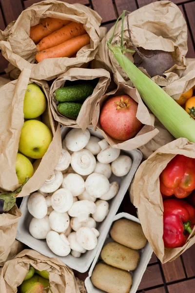 stock image Fresh market delivery, fruits and vegetables in a craft paper bags.