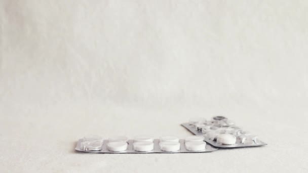 Used Medicine Blister Pack White Red Pills Falling Top Frame — Stockvideo