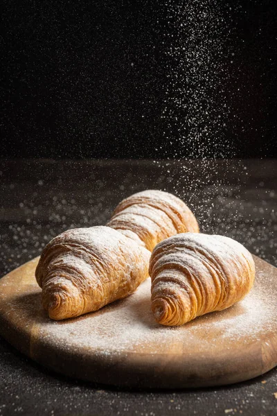 View Three Croissants Table Sugar Falling Wooden Table Selective Approach — Stock Photo, Image
