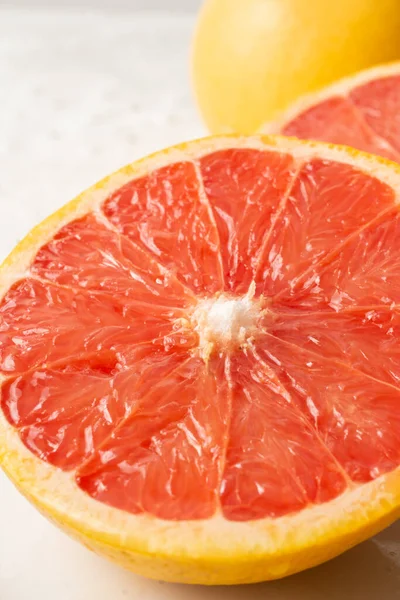 Close Half Red Grapefruit Selective Focus White Background Vertical — Stock Photo, Image