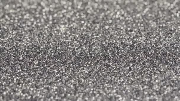 Macro Slide Shot Small Silver Sequins Shimmer Light — Stock Video