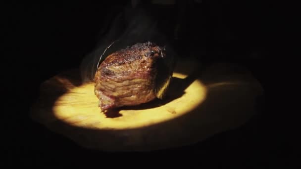 Put Ready Made Steaming Filet Mignon Rotating Wood Tray — Stock video