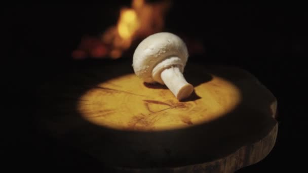 Put Mushrooms Champignon Wooden Spinning Tray Background Fire Light Spotlight — Stock video